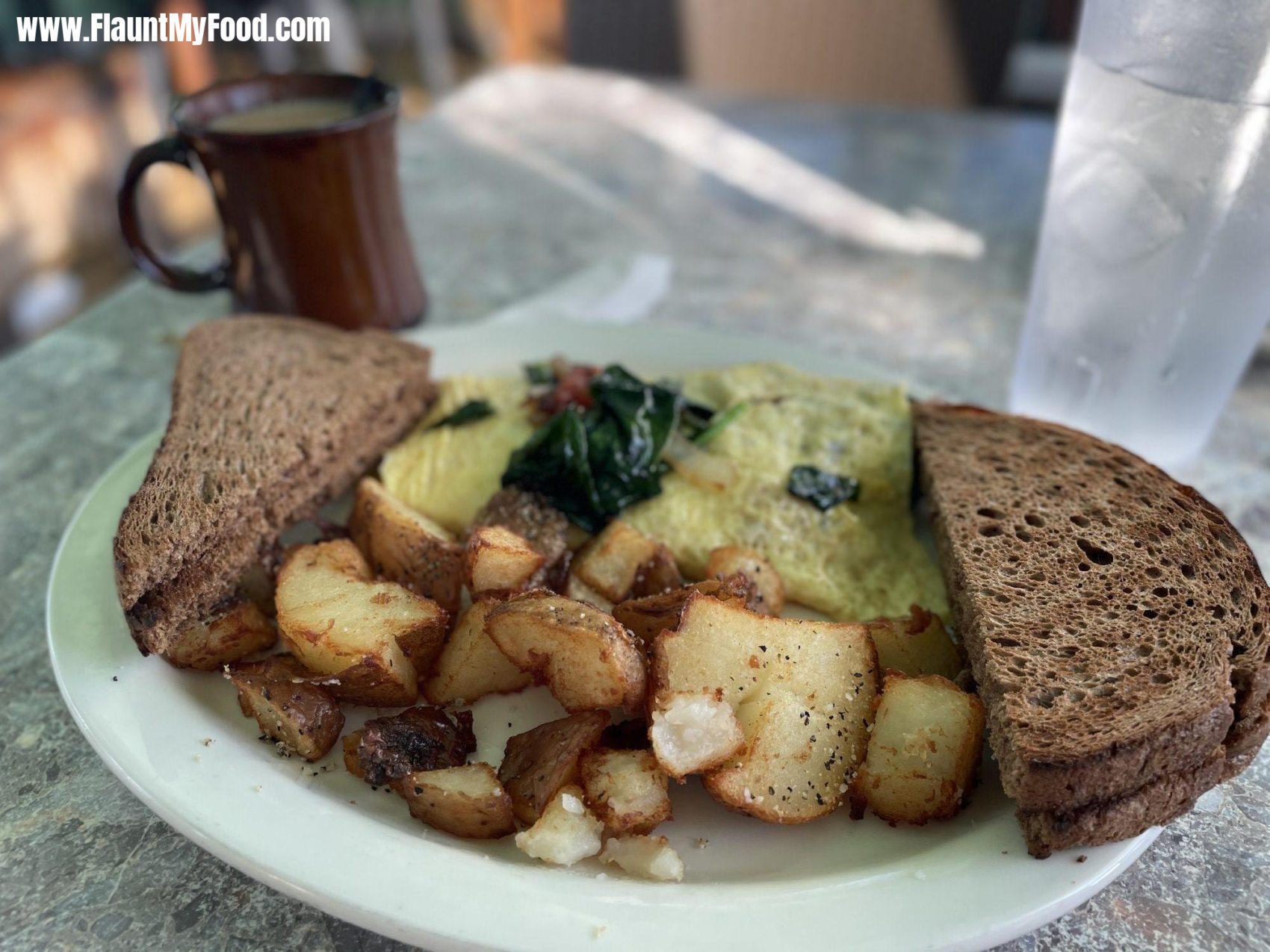 Breakfast at Rod and ReelVeggie omelette with wheat toast and home fries at Rod and reel café on Anna Maria Island Florida