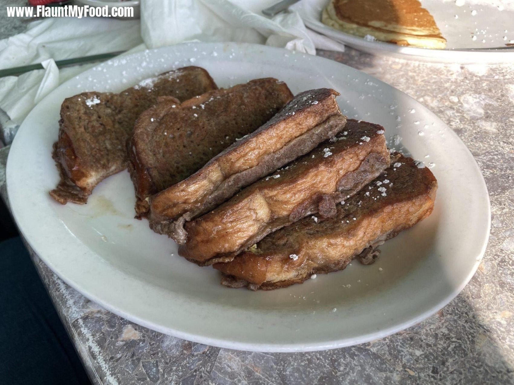 Coconut French toast from rod and reel pier restaurantThis is my delicious coconut French toast from the rod and reel pier café where I had breakfast the other day on Annamaria Island located in Florida and just north of longboat key Florida.