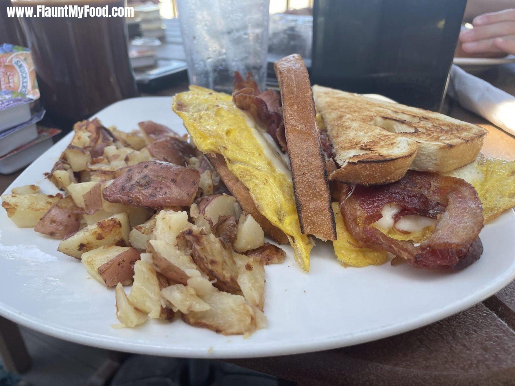 Gulf Drive CafeGulf Drive café located on Annamaria Island this is the breakfast special the eye-opener with home fries eggs and wheat sandwich bread.