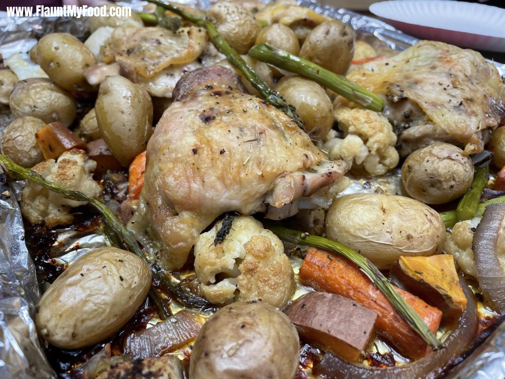 Cooked chicken with vegetables!Cooked chicken with vegetables! We build this very often, we just throw a bunch of vegetables onto a pan with olive oil and then we bake at 500 degrees for about 45 minutes. So good!