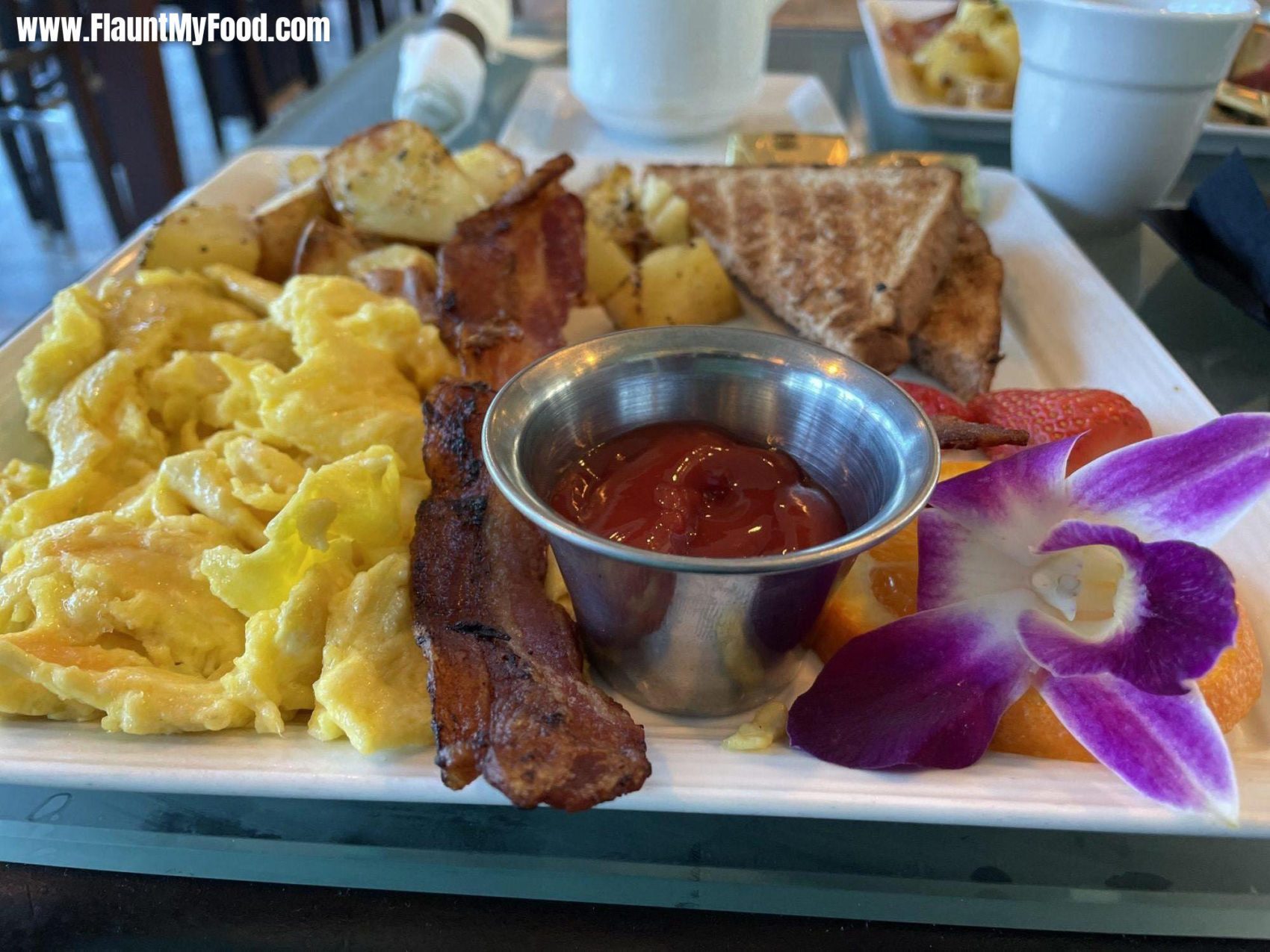 Amazing Hotel Breakfast!This is a great breakfast I had at a Waco Texas hotel near the Magnolia area. It was beautifully presented and the nice added touch of a flower really helped add some class to an already great stay.