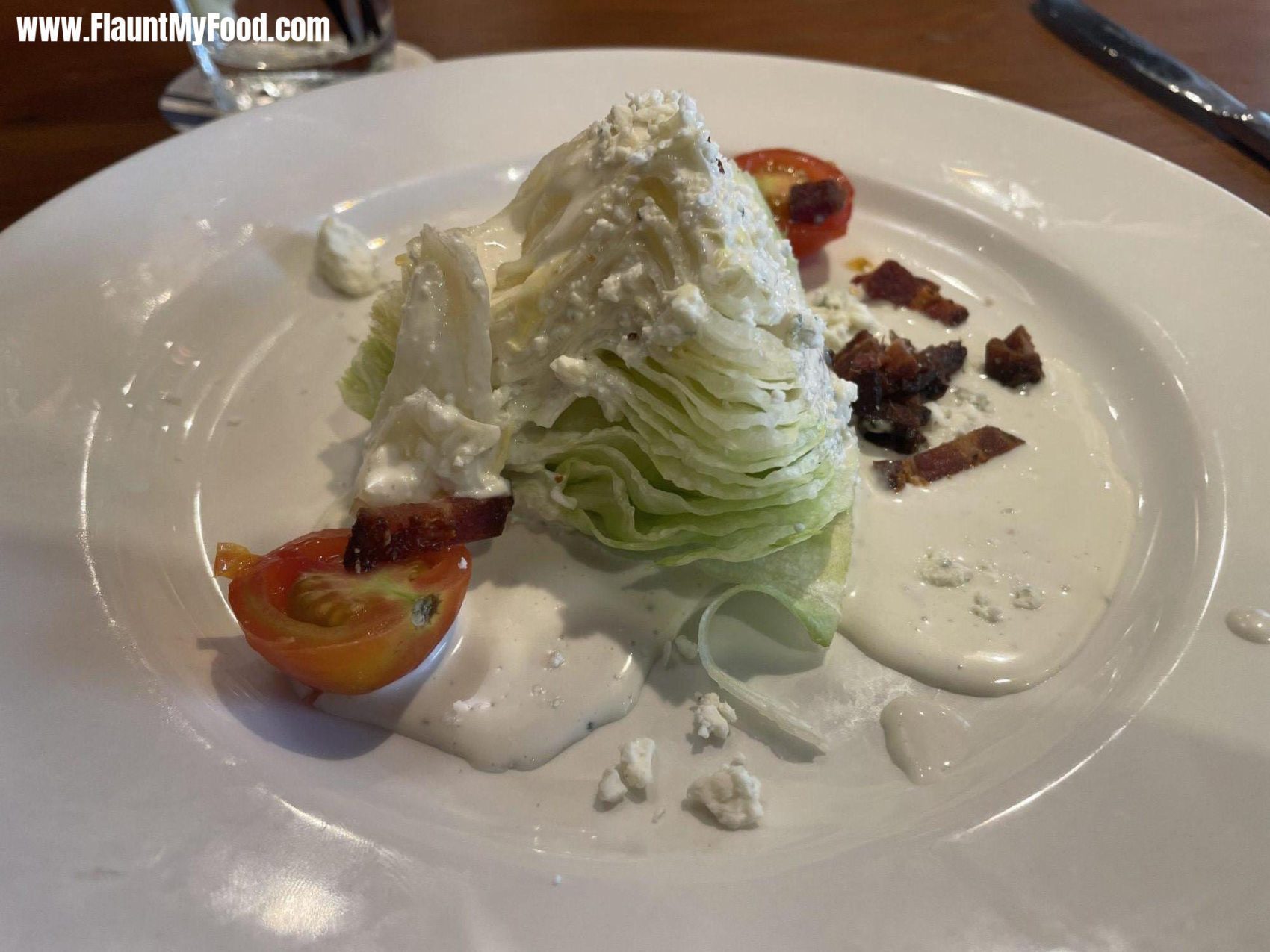 Lunch Salad at Del Friscos Grille Fort WorthLunch Salad at Del Friscos Grille Fort Worth located in downtown Fort Worth Texas. ICEBERG LETTUCE WEDGE Hickory-Smoked Bacon Crumbles, Tomatoes, Blue Cheese Dressing