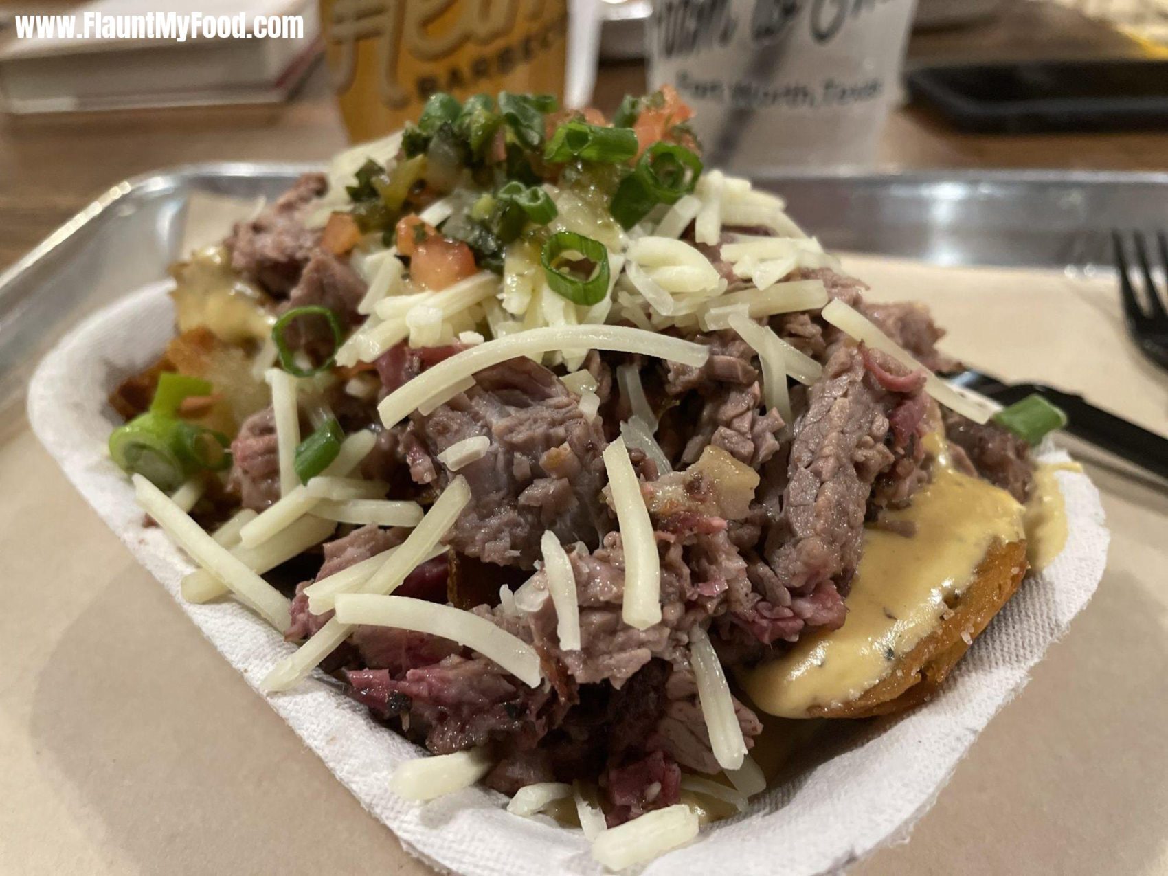 Potato skins with brisket and pico de gallo at Heim BBQ