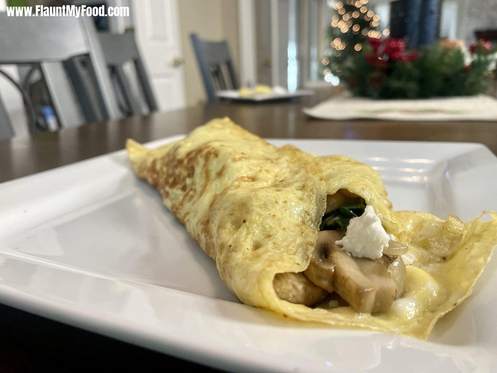 Homemade omelette with egg onion spinach feta cheese mushrooms in Fort Worth TexasHomemade omelette with egg onion spinach feta cheese mushrooms in Fort Worth Texas