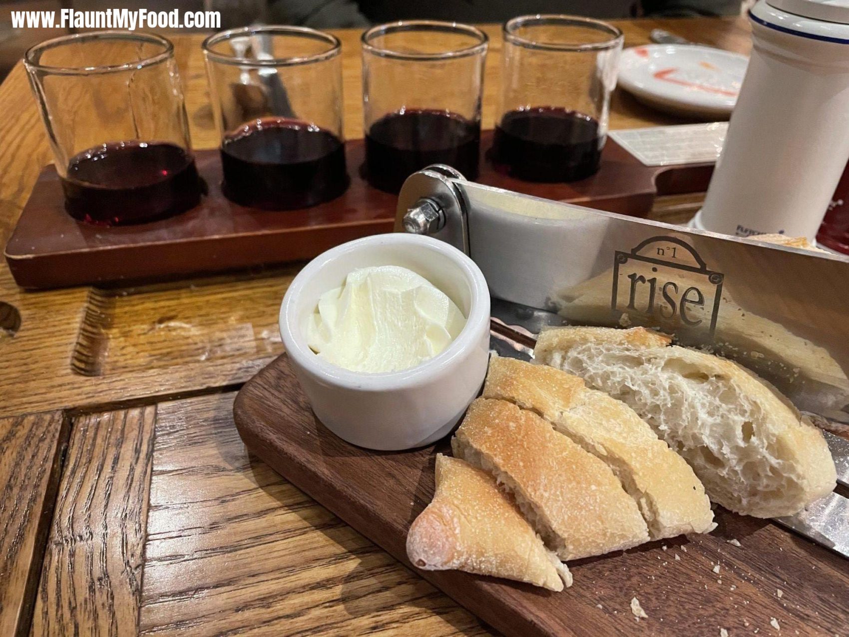 French Red Wine Flight with fresh backed bread Rise Soufflé Restaurant located in Clearfork in Fort Worth TexasFrench Red Wine Flight with fresh backed bread Rise Soufflé Restaurant located in Clearfork in Fort Worth Texas. The four french red wines on our flight were Joseph Droughin Pinot Noir, Clos Mazurique Cabernet France, Chafeau Recougne Bordeaux blend and then finally Vidal-Fleury Cotes du Rhone.