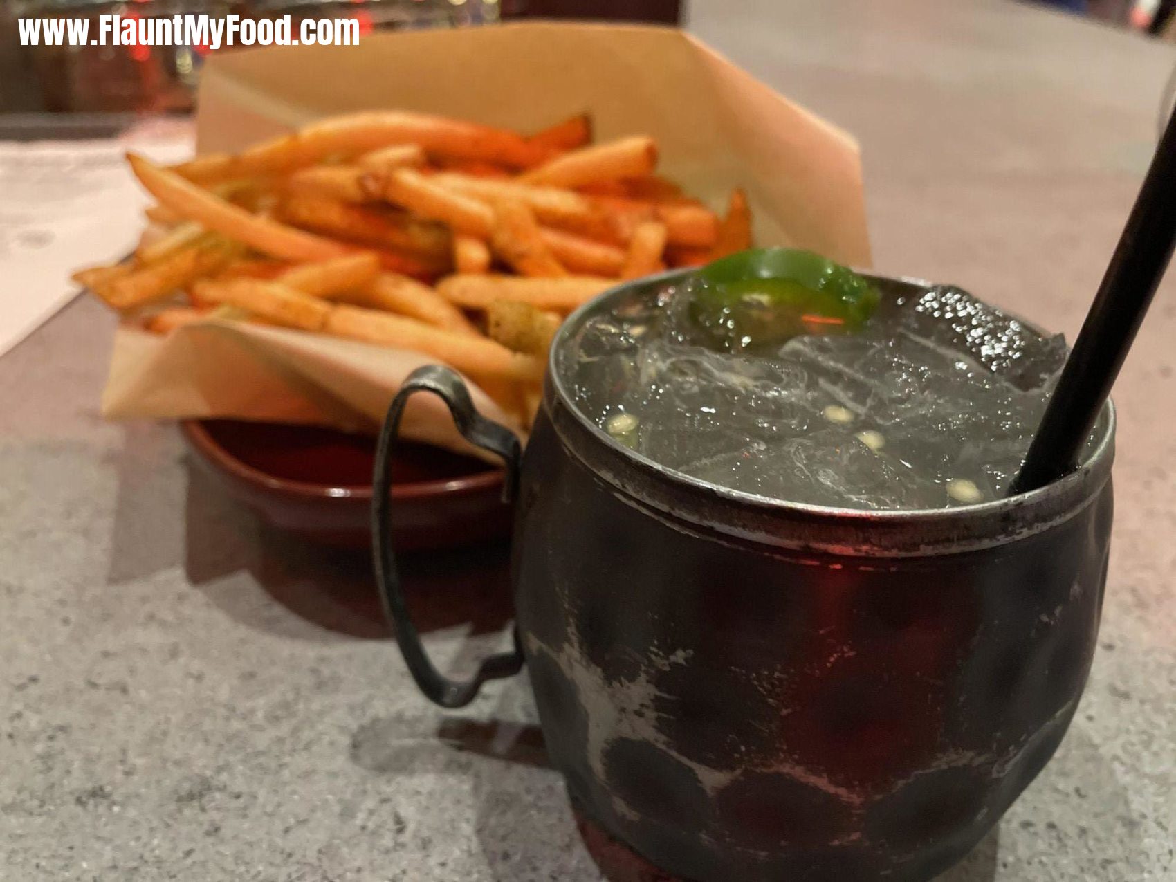 Tricky Fish in Fort Worth Texas - fries and Moscow mule at the tricky fishTricky Fish in Fort Worth Texas - fries and Moscow mule at the tricky fish