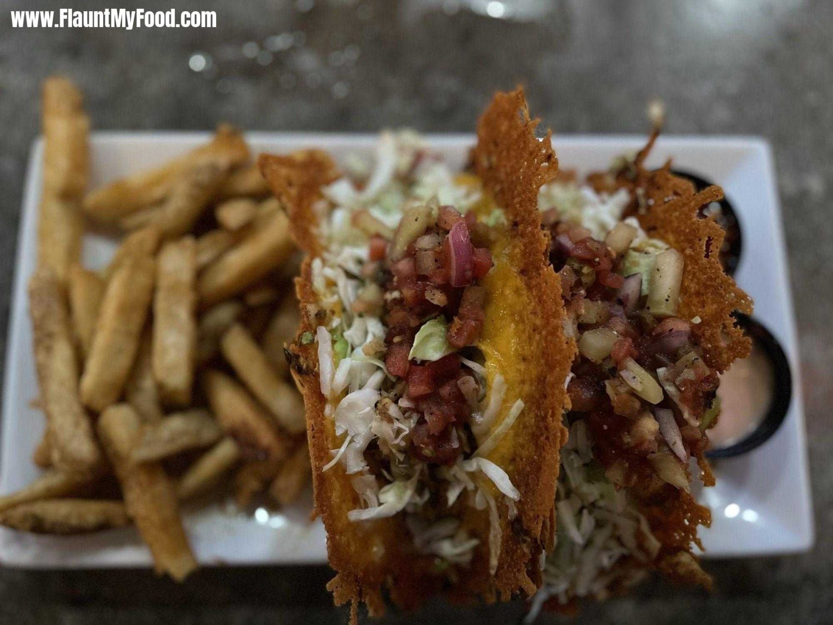 Grouper tacos with french fries at the ugly grouper on Anna Maria Island Florida