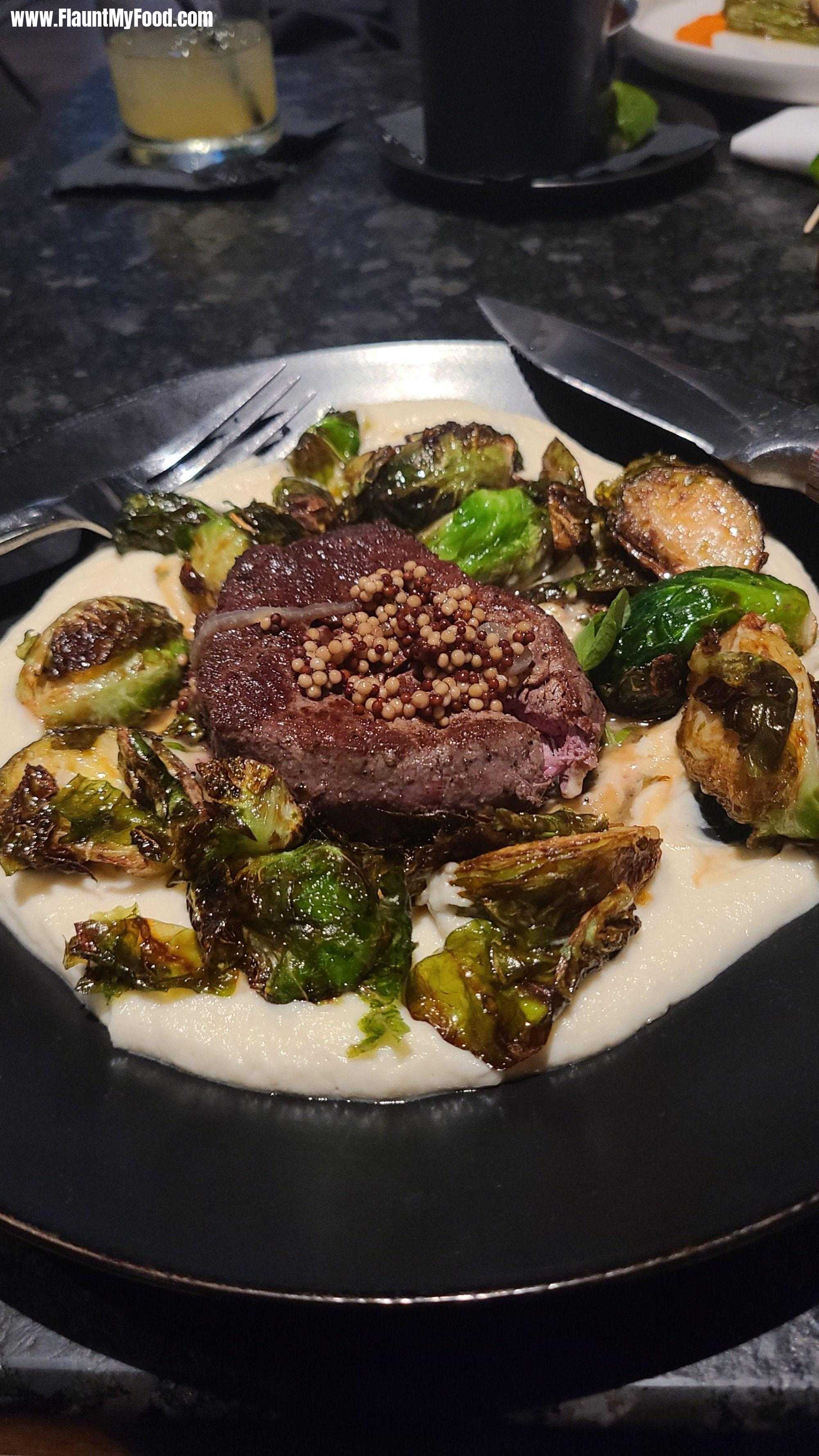 American Revelry Burleson TXColorado beef filet mignon with maple glazed Brussels sprouts, creamy cauliflower puree, topped with pickled mustard seeds.