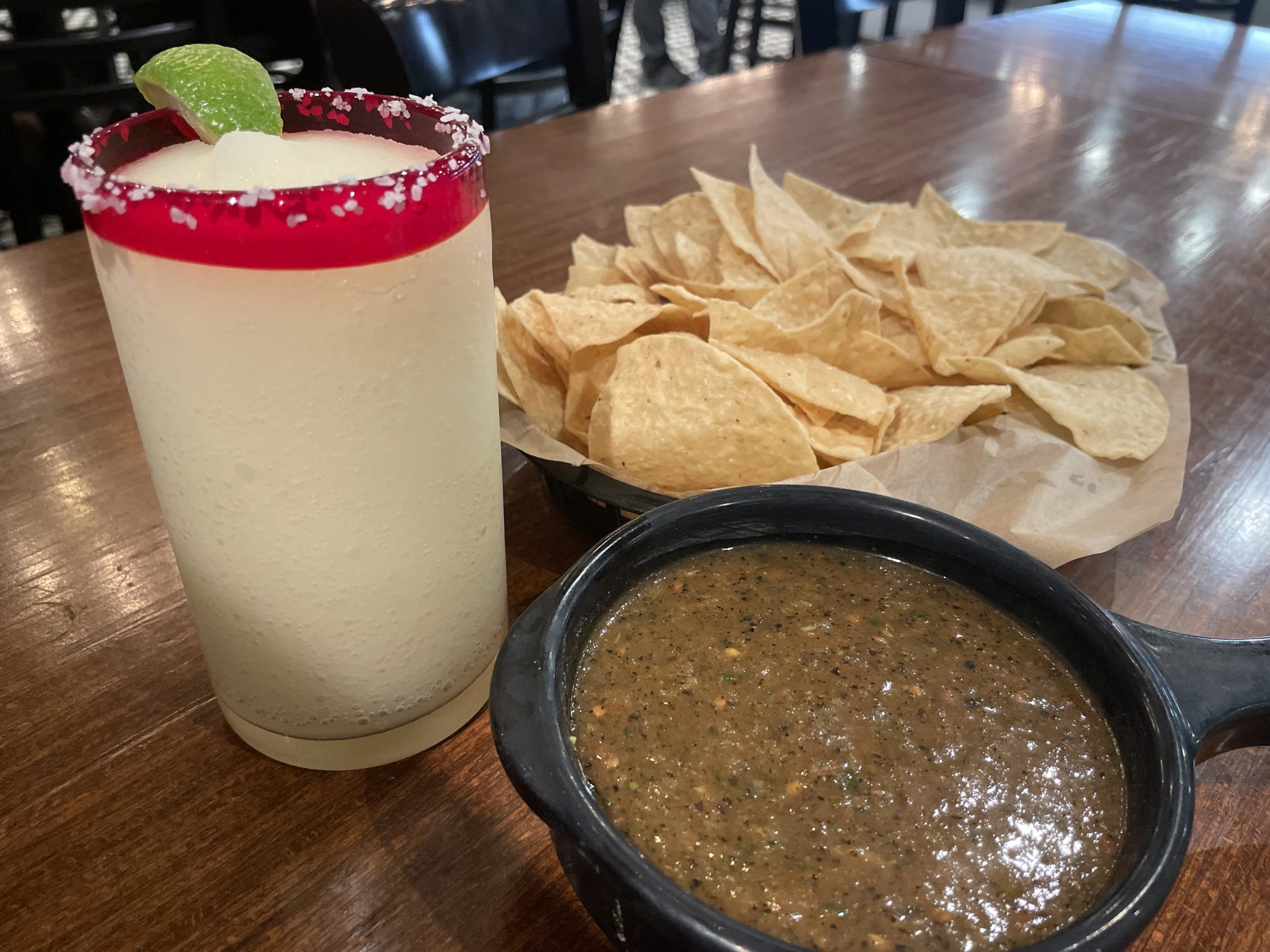 Torchy’s Frozen Marg & Chips and SalsaRoasted salsa, medium heat, delish. Standard Margarita